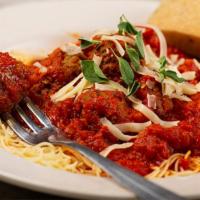 Meatball Pomodoro · meatballs served over angel hair pasta and topped with pomodoro sauce, fresh oregano & shave...