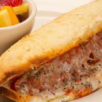 Meatball Sub · meatballs topped with pomodoro sauce, roasted  peppers & onions, italian seasoning and provo...