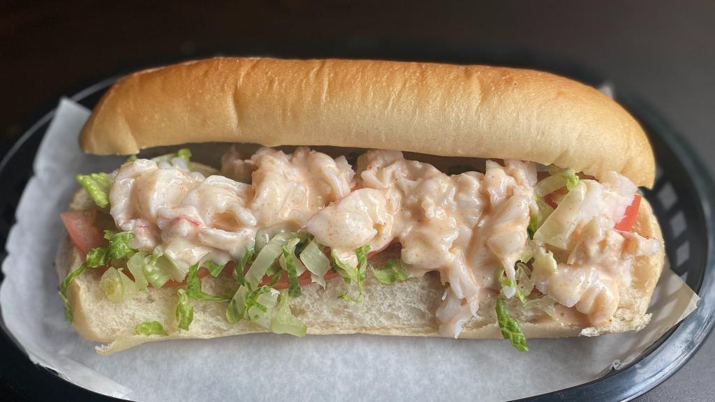 Lobster Roll · Chopped Lobster with  Lettuces and Tomato on Hoagie Roll with Homemade White Sauce. Serve with Choice of Fries