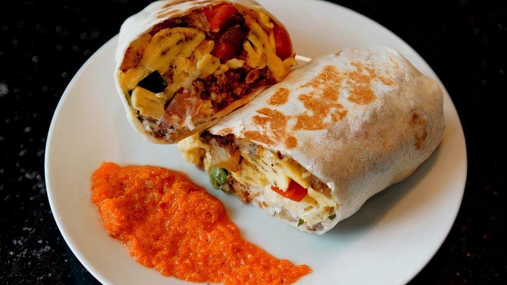 Bad Habit Breakfast Burrito · Poblano cayenne hash, chorizo, egg, monterey jack, pico de gallo, sour cream (carrot habanero salsa on the side)