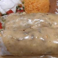 Steak Burritos (2 Pieces) · Burritos filled with thin-sliced steak, grilled with onions and covered with nacho cheese, s...