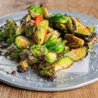 Roasted Brussels Sprouts · Bacon, red bell peppers, olive oil, garlic, parmesan cheese.