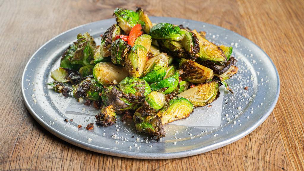 Roasted Brussels Sprouts · Bacon, red bell peppers, olive oil, garlic, parmesan cheese.