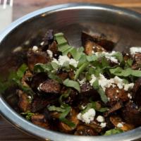 Roasted Mushrooms · Cremini mushrooms, goat cheese, herbs, balsamic, garlic.