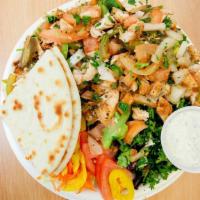 Chicken Shawarma Salad · Meat grilled with onions, bell peppers, and tomatoes. Served with Greek salad.