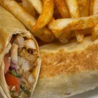 Chicken Wrap · Chicken served with tabbouleh tomatoes and special sauce.