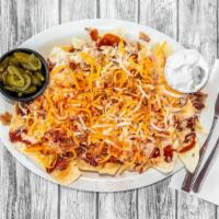Bbq Nachos · Warm chips topped with pulled pork, cheese dip, Corky's famous BBQ sauce, dry rub and a side...