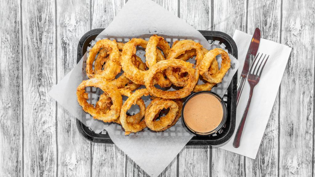Basket Of Onion Rings · A heaping basket of mouth-watering, made from scratch onion rings. Served with our BBQ ranch.