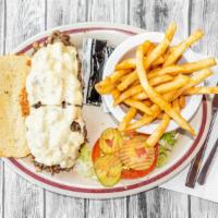 Philly Cheesesteak · Topped with sautéed mushrooms, onions, and hot Pepper Jack cheese, and served on a toasted h...