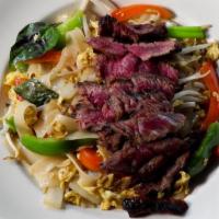 Pad Kee Mao (Drunken Noodle) · Hot. Sauteed Thai flat wide rice noodle, basil, bean sprout, bell pepper, onion, scallion, e...