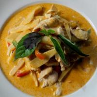 Red Curry · Hot. red curry with coconut milk, bamboo shoot, basil, and bell pepper, with rice.