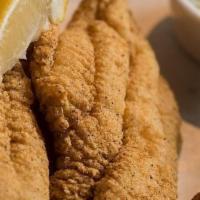 2 Piece Fried Catfish Platter · Two golden fried catfish filets served with coleslaw, hushpuppies, and our homemade tarter s...