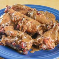 Island Wings · Choice of Island, BBQ Mild or Spicy Jerk.