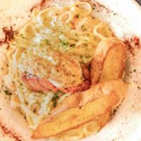 Bayou Seafood Pasta · Shrimp & Crawfish Cajun Alfredo Sauce, Parmesan, Herbs and Fried Shrimp
