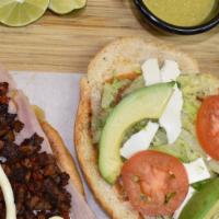 Tortas · Fresh Mexican bread, fried beans, lettuce, tomato, mayonnaise and choice of meat.