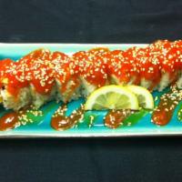 Number 9 Roll · Shrimp tempura topped with cream cheese, tuna slices, sesame seeds and a spicy sauce.