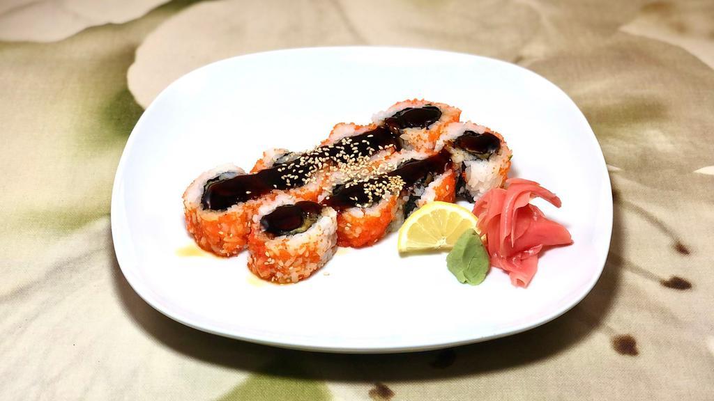 Yummy Yummy Roll · Marinated tuna and spices wrapped in seaweed and fried then wrapped with smelt roe and topped with sesame seeds.