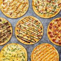 Build Your Own Gluten Free Pizza · Let your creativity shine! Choose your sauce, cheese, toppings, served on our delicious, cri...