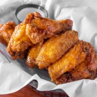 Fried Wings (10) · Lightly breaded, fried, rolled in sauce