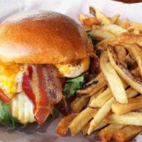 Cheddar Chicken Sandwich · A fresh chicken breast marinated, grilled and topped with mayonnaise, lettuce, tomato, chedd...