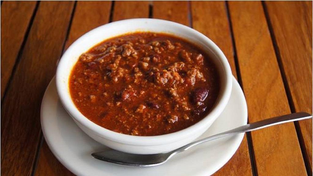 Homemade Chili · Spicy, thick and hearty. Cheese, onions, and sour cream available as toppings.
