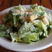 Caesar Salad · Romaine tossed in our caesar dressing topped with parmesan cheese and crunchy croutons