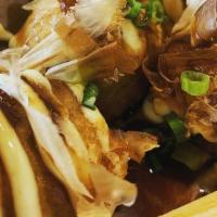 Takoyaki (6) · Octopus Dumplings drizzled with Japanese Mayo and Takoyaki (sweet and tangy) Sauce, finished...