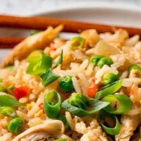 Mama'S Fried Rice L Com Chien · Combination of jasmine rice, mixture of warm peas, carrots and onions with scrambled eggs mi...