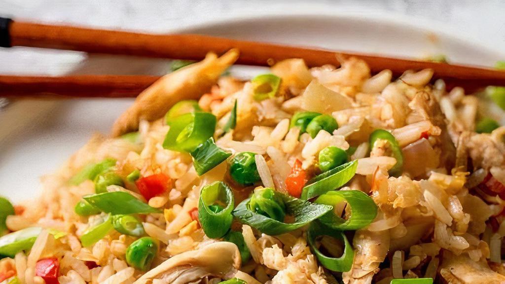 Mama'S Fried Rice L Com Chien · Combination of jasmine rice, mixture of warm peas, carrots and onions with scrambled eggs mixed all together with your protein of choice.