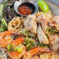 Dry Egg Noodles | Mi Kho (Gf) · (GF option) Dry egg noodles sauté with marinated grilled chicken and shrimp. Garnished with ...