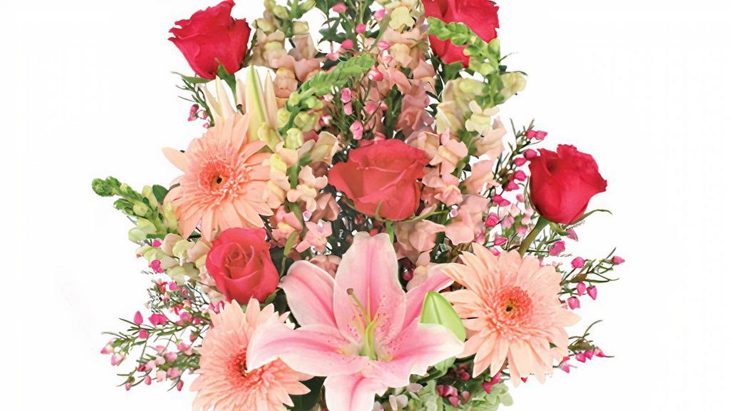 Unconditionally Bouquet · Rose vase, foliage: myrtle, pink lilies (Sorbonne), hot pink roses, pink gerberas, pink snapdragons, hot pink barronia, antique green hydrangea.