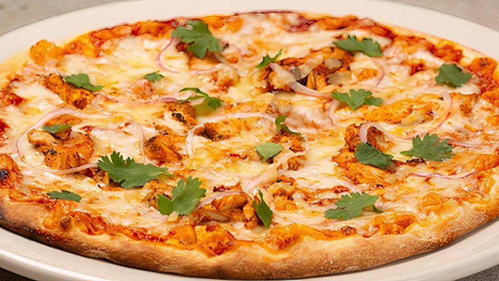 Bbq Chicken · wood-roasted chicken with bbq sauce, smoked  gouda, mozzarella & red onion topped with fresh cilantro