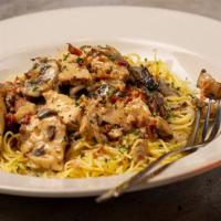 Roasted Chicken Alfredo · crumbled bacon and wood-roasted chicken tossed with wild mushroom alfredo sauce over angel h...