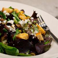Brixx Salad · spring mix with pistachios, crumbled goat cheese & croutons tossed with housemade balsamic v...