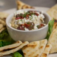 Mediterranean Hummus · Our house made hummus topped with sun-dried tomatoes, kalamata olives and feta cheese.
