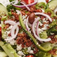 Acropolis Salad · Romaine lettuce and bacon and roma tomato and blue cheese and cucumbers and Bermuda onions a...