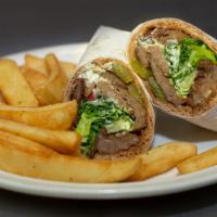Gyro Wrap · Seasoned beef and lamb and thin sliced and delicious and Dressed with lettuce and tomato and...