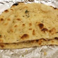 Garlic Naan · Made of dough of fine flour with taste of garlic. free dessert phone takeout