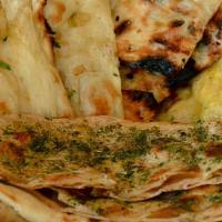 Basket Of 4 Bread · Plain. Garlic. Kashmiri & Tandoori Roti.