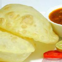 Bhatura · Puffy deep fried bread made with all purpose flour. free dessert phone takeout