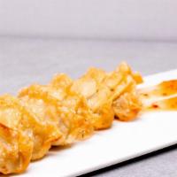 Gyoza · Fried or steamed gyoza with your choice of filling. Served with a side of dumpling sauce.