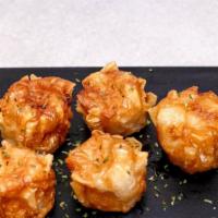 Shumai · Fried or steamed. Served with a side of dumpling sauce.