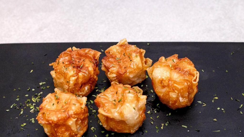 Shumai · Fried or steamed. Served with a side of dumpling sauce.