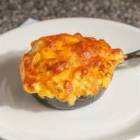 Macaroni & Cheese · Premium Macaroni and cheese cooked just for you when you order. It is creamy with multiple c...
