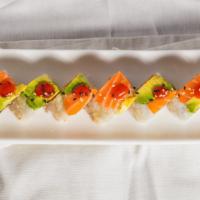 Pink Lady Roll · Uncooked roll. Spicy salmon and crunch inside with fresh salmon and avocado on top.