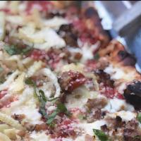 Pigs On The Wing · Red Sauce, Mozzarella, Italian Sausage, Fennel