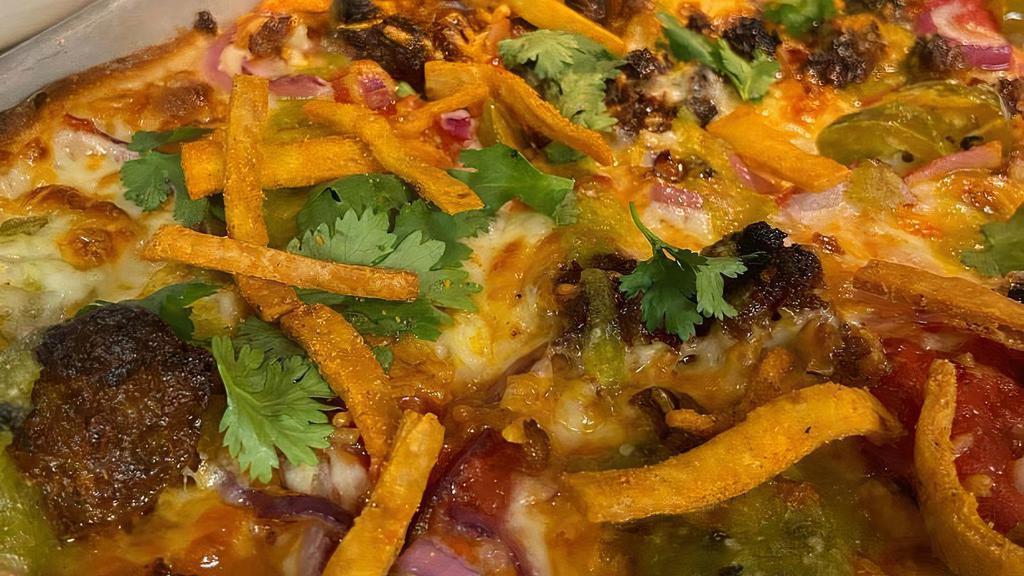 Mexican Street Pizza · Red Sauce, Cheddar, Mozzarella, Red Onion, Jalapenos, Chicken, Chorizo, Avocado Crema, Cilantro