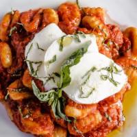 Gnocchi · Homemade potato dumplings in tomato basil sauce topped with mozzarella