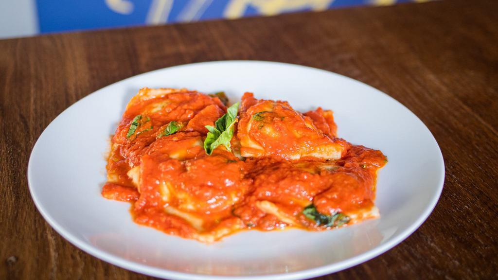 Ravioli Classico · Homemade ravioli stuffed with ricotta and spinach, butter sage or tomato sauce