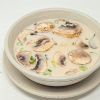 Tom Kha Gai Soup · Chicken poached in coconut milk broth with lemongrass, fresh silver galangal, onions, mushro...